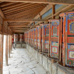 Just in case, we too walked along the prayer wheels and turned each one of them.
