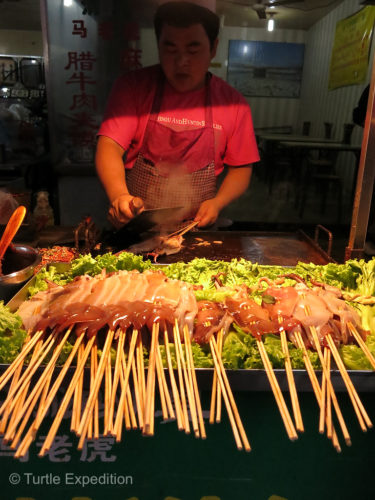 Cute little baby squid on a barbecued skewer. Had to try one!