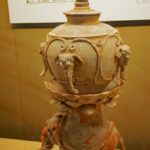 Painted stupa pot with elephant pedestal, Tang Dynasty