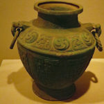 Bronze “Lei” wine container with stylized dragon pattern, Mid-Western Zhou Dynasty