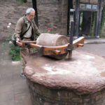 This old grinding mill was a treasure saved, and may have been used not that long ago.