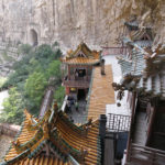 The ornate tile roofs added to the impossibility that the whole structure was hanging from a cliff.