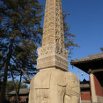 A long colonnade was lined with beautiful elephant columns.