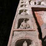 All along the cliff there were small chapels and walls of various Buddha figures.