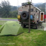 The totally abandoned parking lot made one of our quietest camps on the entire expedition across China. Green slept well in her cozy little MSR tent.