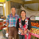 This vendor asked to have her photo taken with the foreigners.