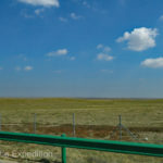 The horizon started to open up as we neared Mongolia. The standard guardrail and 8-strand barbwire fence left no option to leave the highway.