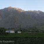 Surrounded by snow-clad peaks of the Pamirs, the “village” is more a community of homes in-between potato and grass fields laced with a web of small interconnected irrigation channels.