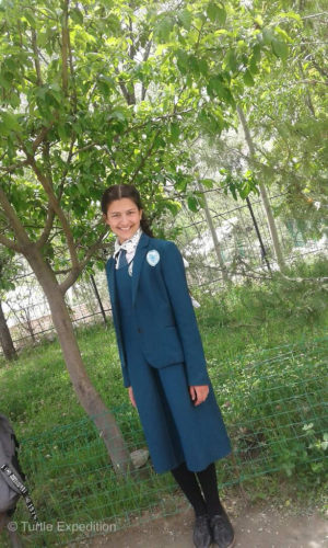 Ready for school in her winter uniform, she looks quite professional.