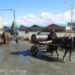 By following a horse-drawn water cart, we were able to fill our own tank with water, one 5-gallon bucket at a time.