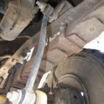 This is what the frame anti-sway bar bracket on the passenger side should have looked like.