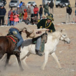 A sheep carcass was tossed on the ground and the riders, two at a time, would pick it up and get a firm grip for an exciting tug-a-war that could last several minutes until one of the riders succeeded in wrestling the bloody carcass away from the other.