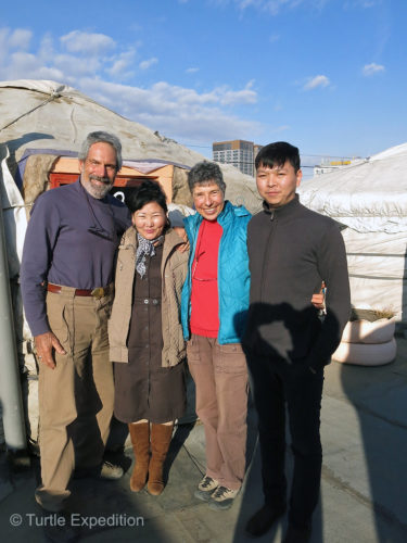 We posed on the roof top of Gana’s Guesthouse in Ulanbaatar with Gana’s wife and his son who now helps manage the “yurt hotel”. Our old friend was off on a fishing trip.