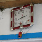 Modern technology: a battery powered clock hung on the wall.