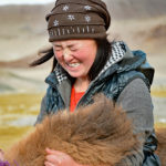 Apparently the older girl had never been on a camel before and so it was an exciting moment.