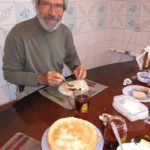 Gary is enjoying the fresh crêpes Nina prepared as a welcome snack.