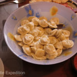 Homemade Pelmeni served with lots of butter are a special tradition in Russia.