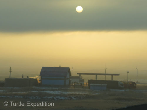 Habitation fog created a moody sunrise.