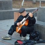 This street musician was playing some old Beatles songs. We knew we were getting closer to home.