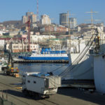 The French travelers waiting to load their vehicle onto the ferry.