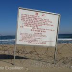 This sign clearly shows the dangers South Koreans face every day even 100 miles from the DMZ zone.