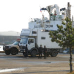 While waiting for customs paperwork at the Donhae Port, our expedition vehicles were inspected by locals.