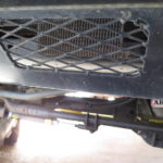 A rock-guard protects the power steering cooler.