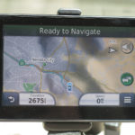 Visible from both driver and passenger, a Garmin GPS supplies navigation information.