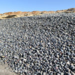 Two feet deep, these smooth dunes of rocks were nearly impossible to walk on.