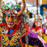 Some dancers wear costumes that represent the robes worn by Spanish Catholic priests who attempted to convert the indigenous peoples to Catholicism.