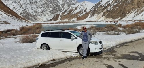 Our friend is enjoying the view of the surrounding Pamir Mountains.