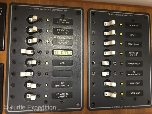 The Battle Born battery bank supplies 12-V power to our Blue Sea circuit board which contains individual breakers for every electrical outlet in the camper.